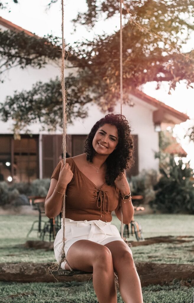 woman, swing, outdoors, nature, garden, sunset, curls, brunette